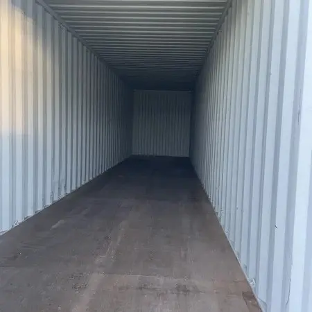 en 1
