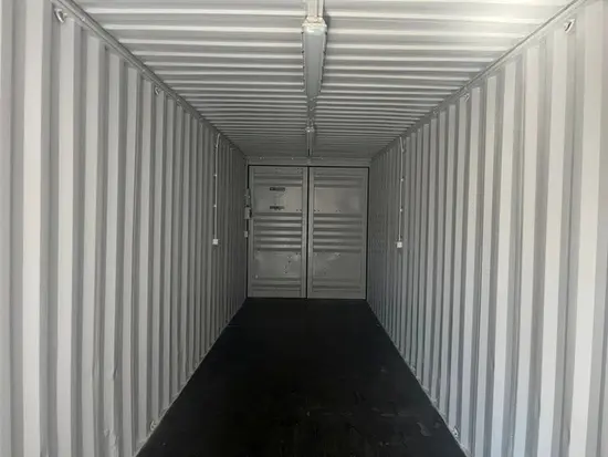 en 1