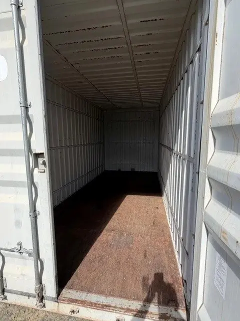 en 1
