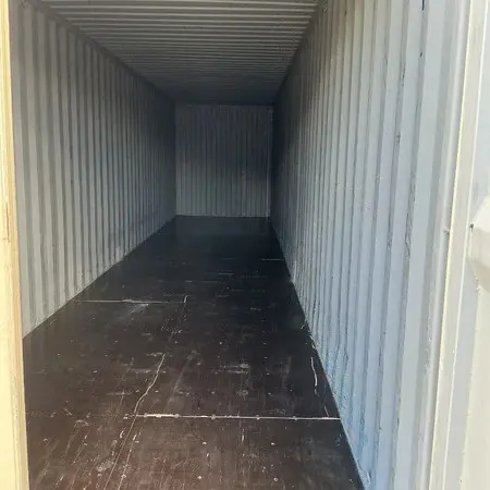 en 1