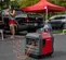 Génératrice portative de 3 000 à 3 400 W HONDA rouge et noire, essence