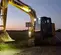 Excavatrice KOBELCO jaune et grise 13,6 à 15,9 t, aucun balancement de l’arrière