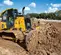 Bulldozer JOHN DEERE jaune et gris de 90 à 95 ch