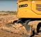 excavatrice KOBELCO orange et grise de 12 à 15 000 kg, balancement de l’arrière zéro