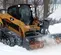 Souffleuse à neige PALADIN grise et jaune pour chargeuse à direction à glissement