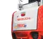 Mini-excavatrice électrique rouge, blanche et noire de 1 200 kg
