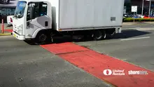 Truck in front of a Steel Road Plate