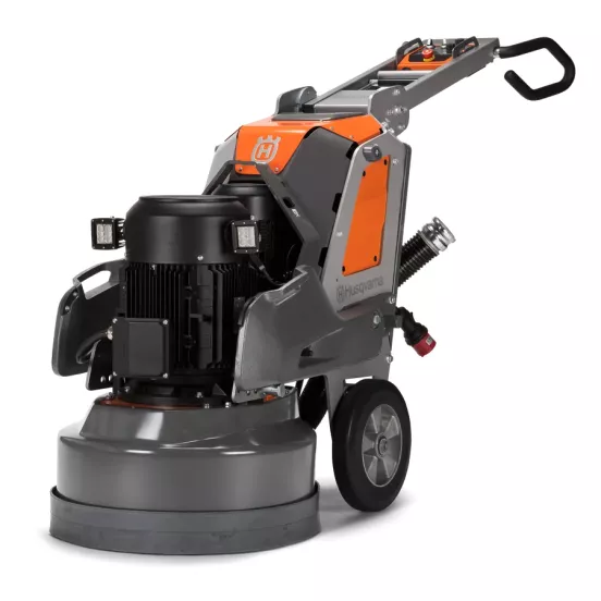 Rectifieuse à béton à conducteur accompagnant Husqvarna orange et noire